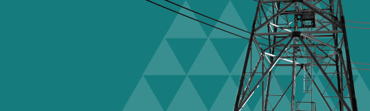 An electricity pylon with power lines, representing the Power and Transmission sector.